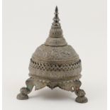 Burmese white metal parcel gilt bowl and cover, worked with panels of dancing figures and beasts,