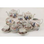 Group of Newhall porcelain tea wares, pattern number 421, comprising two fluted covered teapots,