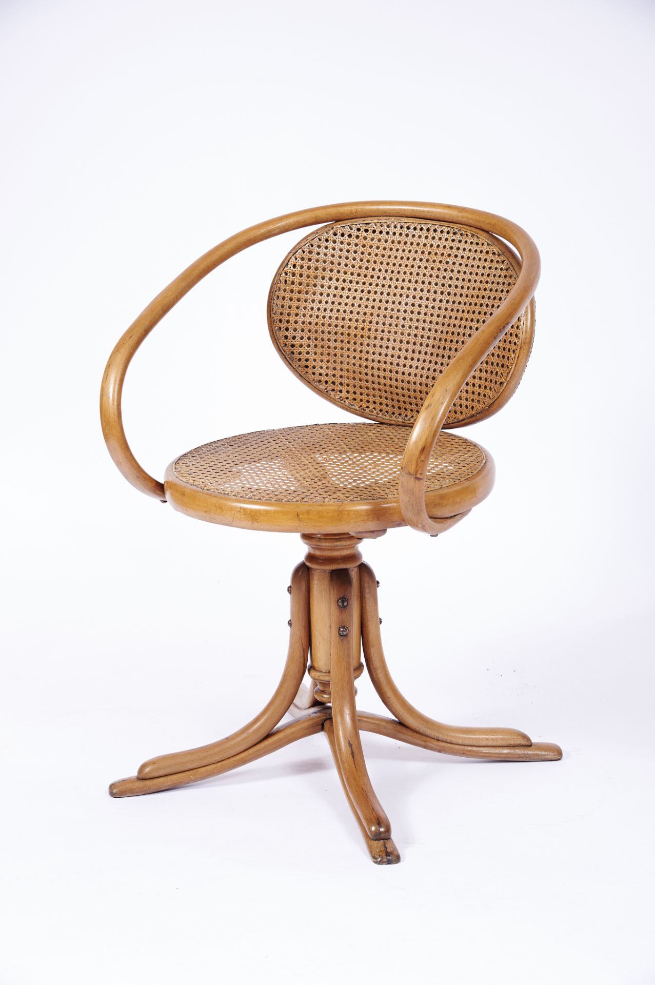 A Rotating Armchair steam-bent beech straw back and seat Austrian 19th/20th C. restoration minor
