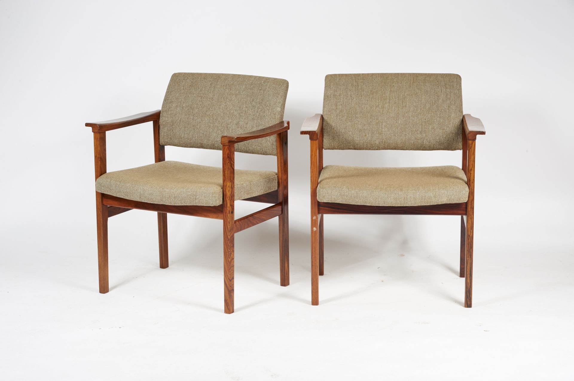 A Pair of Armchairs Brazilian rosewood upholstered backs and seats Danish 20th C. (the 60s) marked
