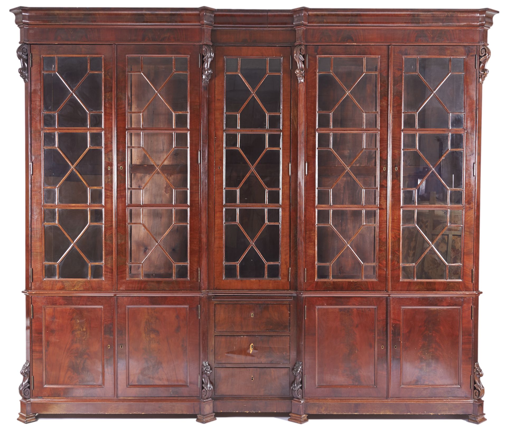 A Glassware Cupboard romantic carved mahogany and burr-mahogany glazed upper body doors Portuguese