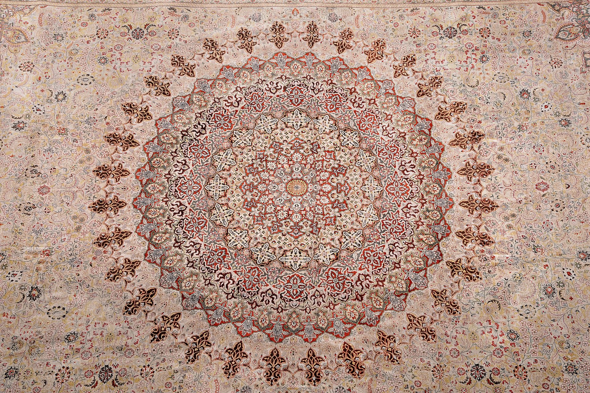 A Carpet, Tabriz, wool yarn, decoration in shades of brown, Middle East, 20th C., signs of use, Dim.