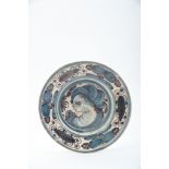 A Dish, faience, blue ad vinous «Aranhões» decoration "Female bust", Portuguese, 17th C. (2nd half),