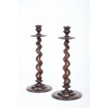 A Pair of Candlesticks, turned Brazilian rosewood, Portuguese, 17th/18th C., restoration, signs of