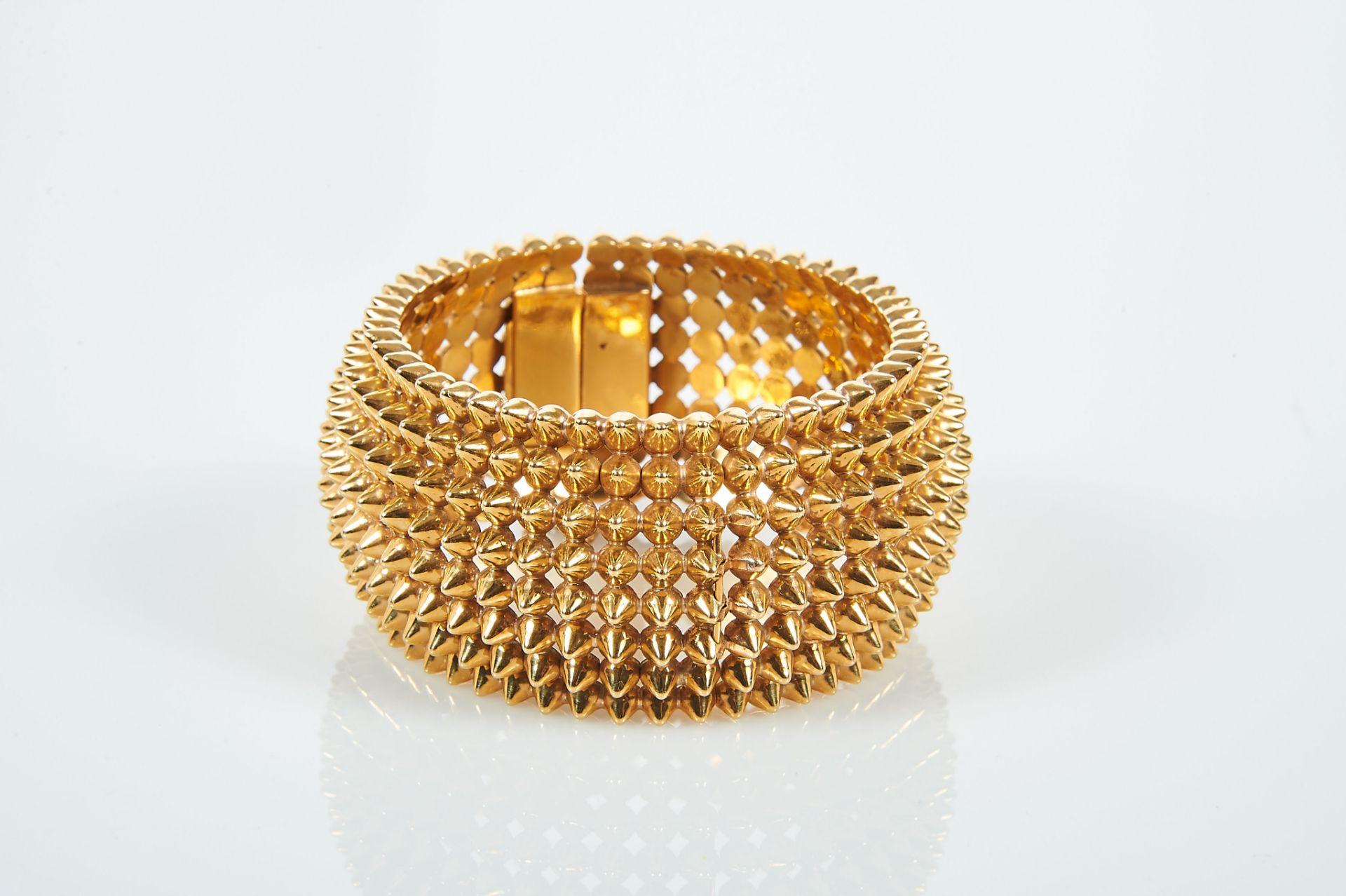 A Rigid Bracelet, 800/1000 gold, pierced decoration "spikes", Portuguese, Oporto mark (1938-1984),