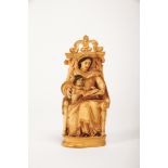 Saint Anne in Majesty teaching Our Ladyto read, gilt and painted ivory sculpture,, Indo-