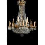 A Twenty Four-light Bag Chandelier, Charles X (1824-1830), gilt bronze en relief, glass beads and