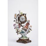 A Table Clock "Rooster", polychrome porcelain sculpture, gilt bronze base and monture with