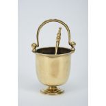 A Vessel for Holy water with aspergillum, brass, cast iron handle, 19th C., signs of use, minor