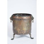 A Wood Bucket, copper en relief "Imaginary heraldic crest", handles with "lion heads" and brass