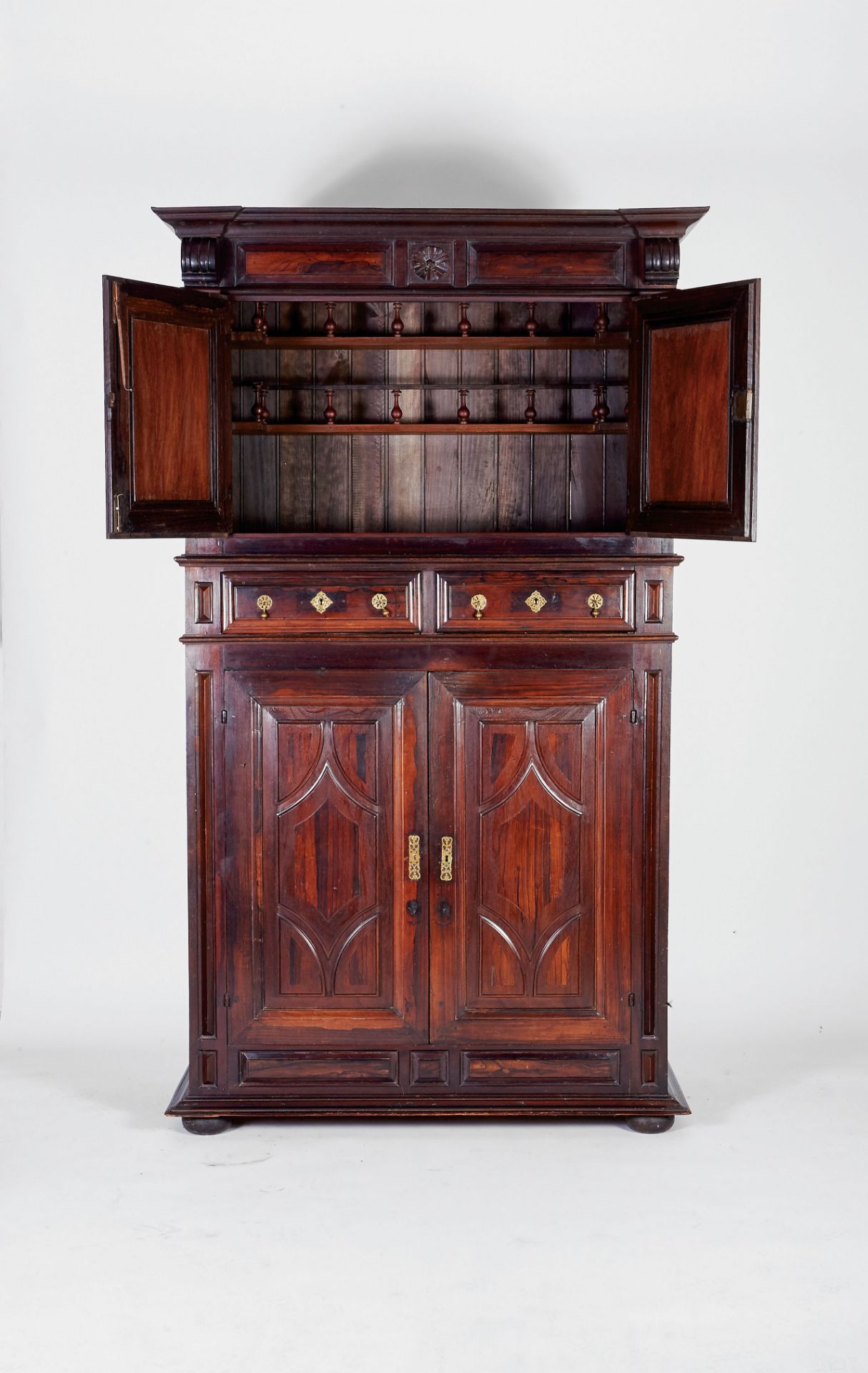 A Glassware Cupboard, Marblewood and Brazilian rosewood, padded doors, scalloped and pierced