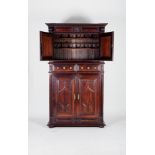 A Glassware Cupboard, Marblewood and Brazilian rosewood, padded doors, scalloped and pierced