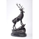 Deer, a pair of bronze sculptures, marble stands, French, 20th C. cast, signed J. MOIGNIEZ -