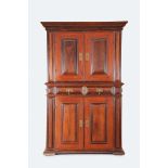 A Glassware Cupboard, mannerist, red Brazilian chestnut and Brazilian rosewood, padded doors and