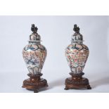 A Pair of Large Covered Vases, Japanese porcelain, «Imari» decoration "Flowers", European carved