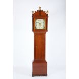 A Longcase Clock, oak case, ribbed columns and friezes with brass applications, painted dial, 30-
