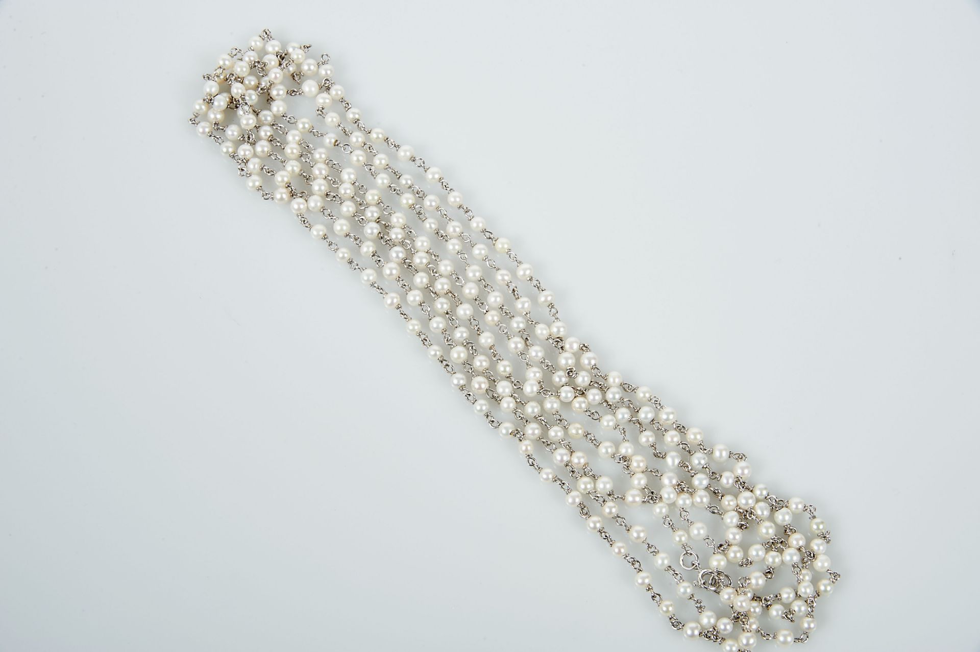 A Necklace, 800/1000 white gold meshed culture pearls (4,5mm)ed, Portuguese, Oporto mark (post