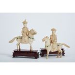 Emperor and Empress on Horseback, a pair of ivory sculptures, coloured applications, wooden stand,