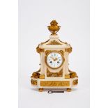 A Table Clock, Louis XVI style, white marble case with gilt, chiselled bronze mounts en relief "