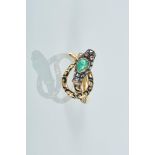 A Ring "Snake", 800/1000 gold and 833/1000 silver, decorated with enamel and set with an emerald,