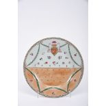 A Scalloped Dish, Chinese export porcelain, polychrome decoration "Night and day" with the coat of