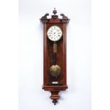 A Viennese Wall Clock "Grande Sonnerie", exotic wood case, eight-day autonomy, hour striking and