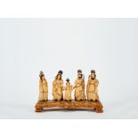 The Holy Kinship, five gilt and painted ivory sculptures, silver hallos and canes, Indo-