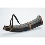 A Canteen, yak horn, copper and brass applications, leather handles, Southeast Asia, 18th/19th C.,