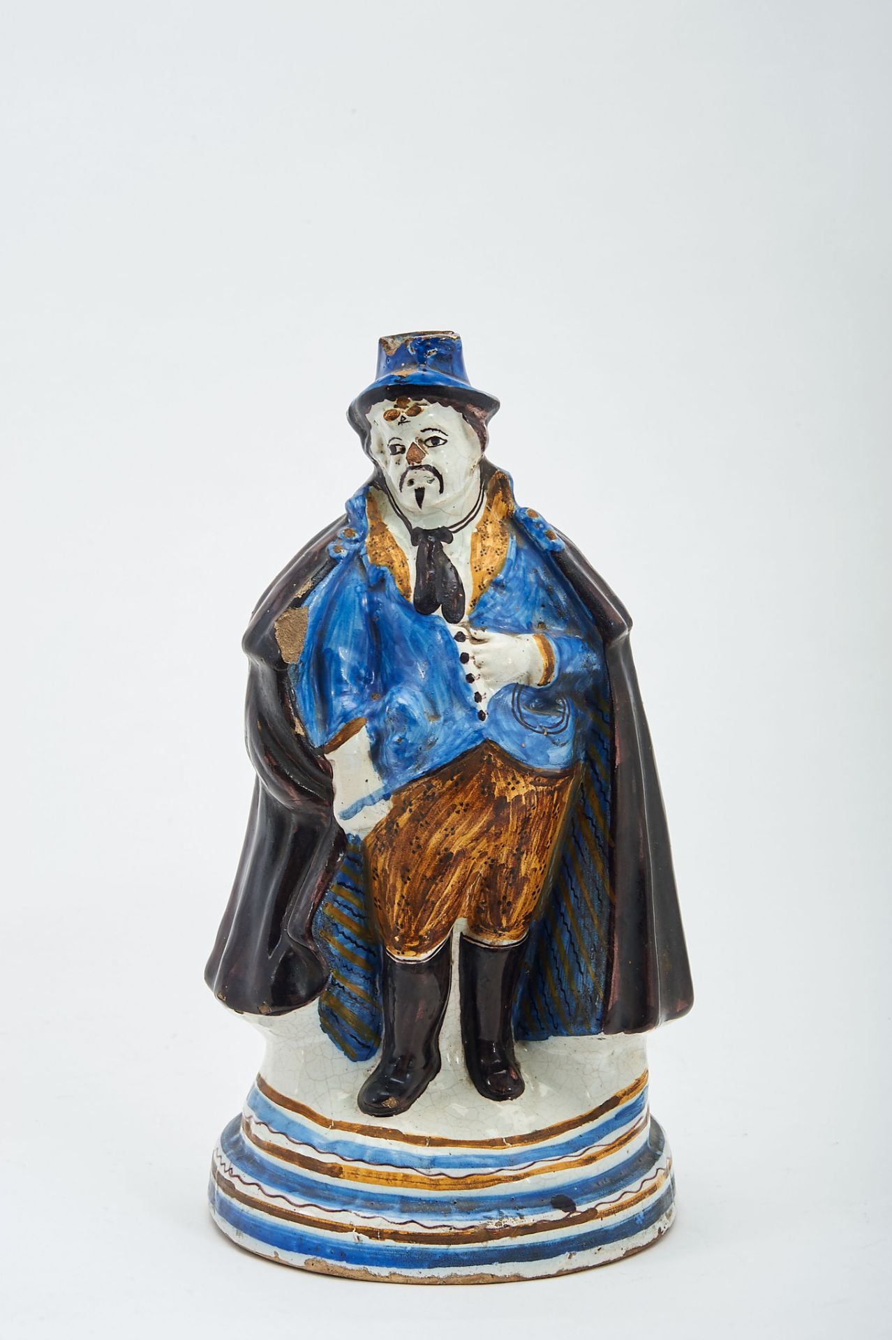 A Bottle "Male figure", faience, decoration in shades of brown and blue, Portuguese, 19th C. (2nd