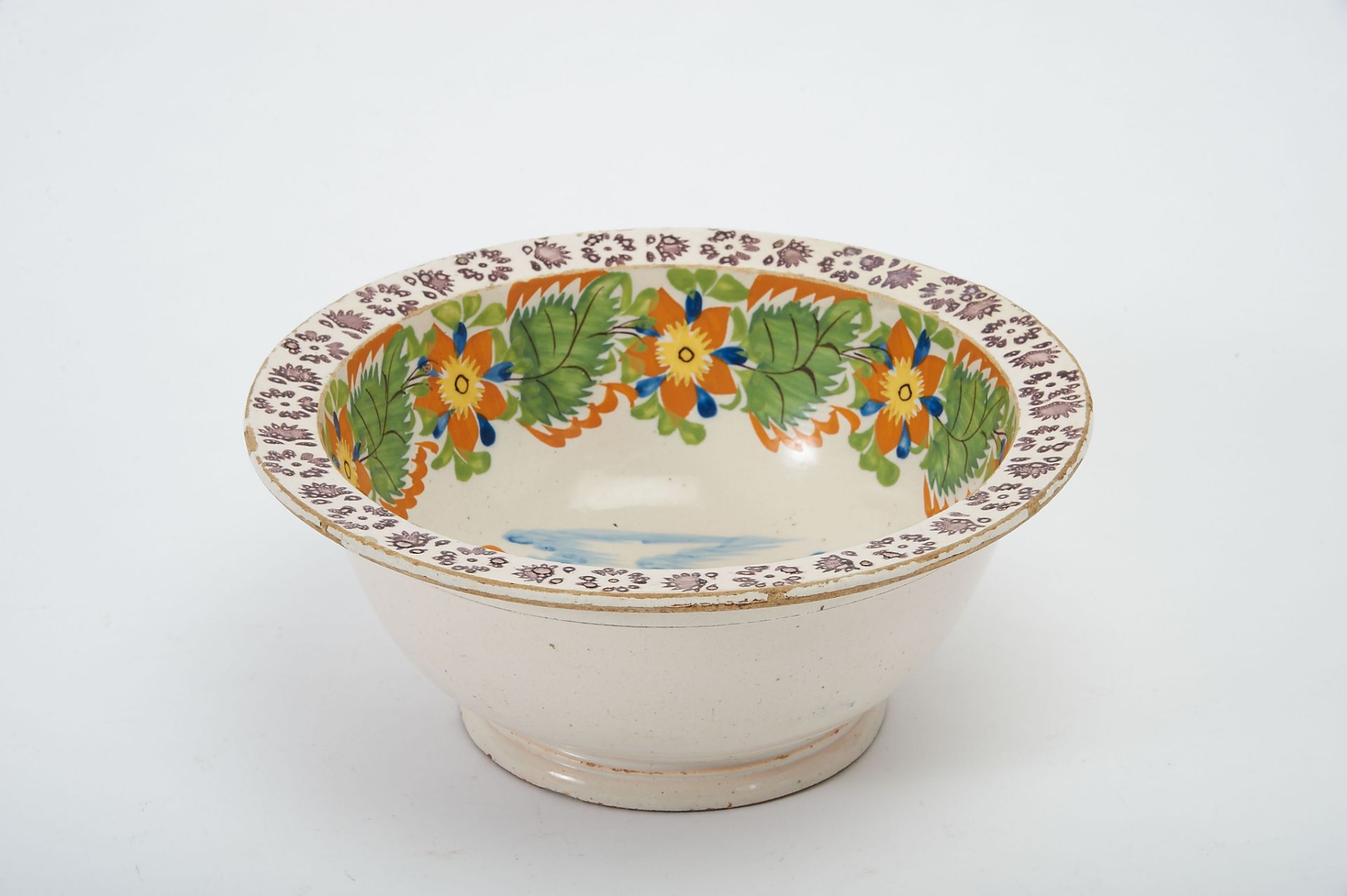 A Basin, faience probably from Bandeira Manufactory, polychrome decoration "Bird and butterfly"