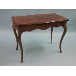 A late Victorian burr walnut card table, serpentine-shape with cross-banding and ormolu mounts in