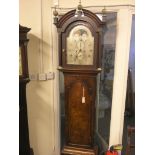 A George III 8-day longcase clock, 12in. arched, silvered dial signed Plowman, Chichester, with