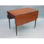 An early 19th century mahogany Pembroke table, with single frieze drawer, on turned, tapering legs