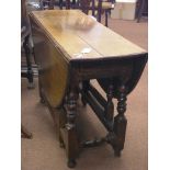 An 18th century oak gateleg table, with single drawer, on baluster-turned underframe, 3ft. 6in.