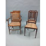 A pair of Edwardian inlaid mahogany drawing-room elbow chairs, with upholstered seats and backs,