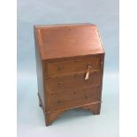 An Edwardian inlaid mahogany lady's bureau, enclosed fittings above three drawers, 2ft.