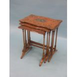 A good Edwardian satinwood nest of three tables, each serpentine-shaped, painted throughout with
