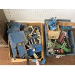 A large Record heavy duty bench vice, and numerous other vices and clamps