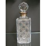 An Asprey silver-mounted glass spirit decanter, hobnail-cut body with stopper, London 1983, 10.5in.