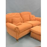 An Ashley & Lawrence (Worthing) two seater settee, upholstered in a peach velour, four loose