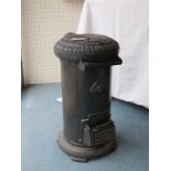 A Portways cast iron Tortoise stove, cyclindrical shape, size 2