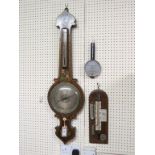 A Victorian grained rosewood wheel barometer, silvered barometer and thermometer dials, 37in. - case