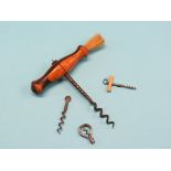 Three novelty miniature corkscrews, and a Victorian full-size corkscrew with rosewood handle and