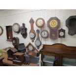 An assortment of clock and barometer cases, as viewed