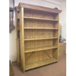 A waxed pine open bookcase, five fitted shelves, 4ft. 2in.