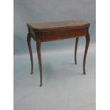A French transitional-style mahogany and parquetry card table, D-shape top with inlaid lozenge