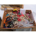 A quantity of costume jewellery, including a number of bead necklaces and bangles