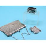 A silver mesh evening purse, with blue stone acorn clips, and a near-matching miniature silver