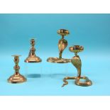 A pair of Victorian bell-metal candlesticks, 6in., and a pair of Indian brass serpent candlesticks