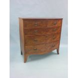 An early Victorian bow-fronted mahogany chest, two short and three long oak-lined drawers, flame-